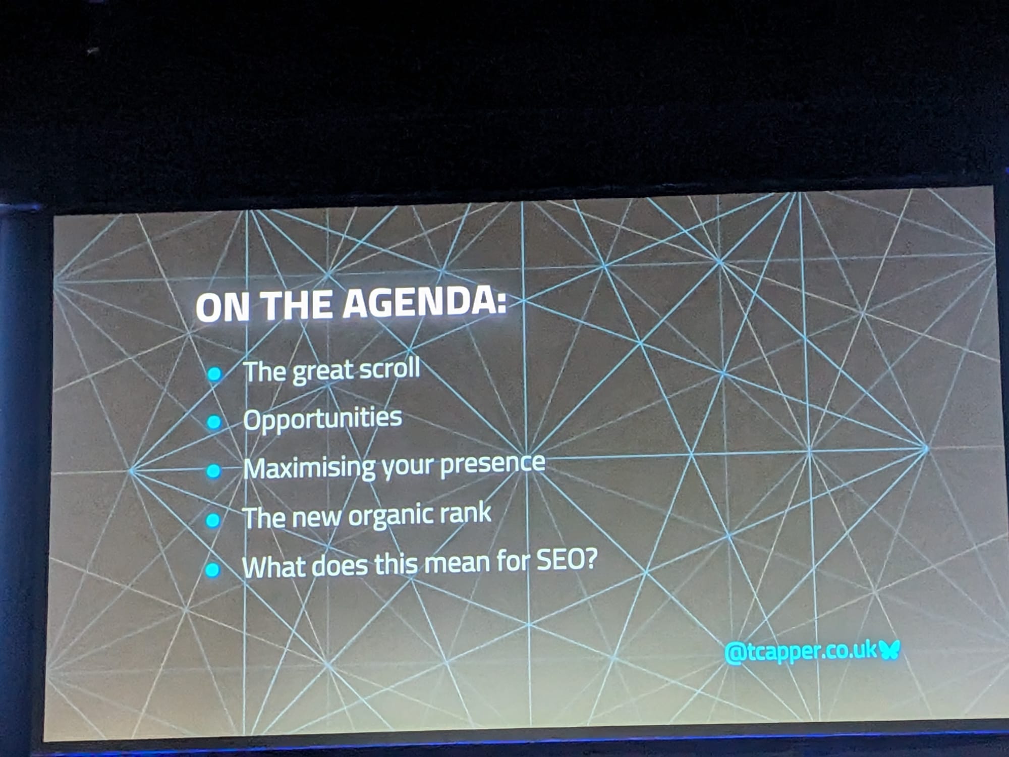 Tom CapperのBrightonSEO 2026登壇スライド「On The Agenda」 - 議題: The great scroll、Opportunities、Maximising your presence、The new organic rank、What does this mean for SEO?
