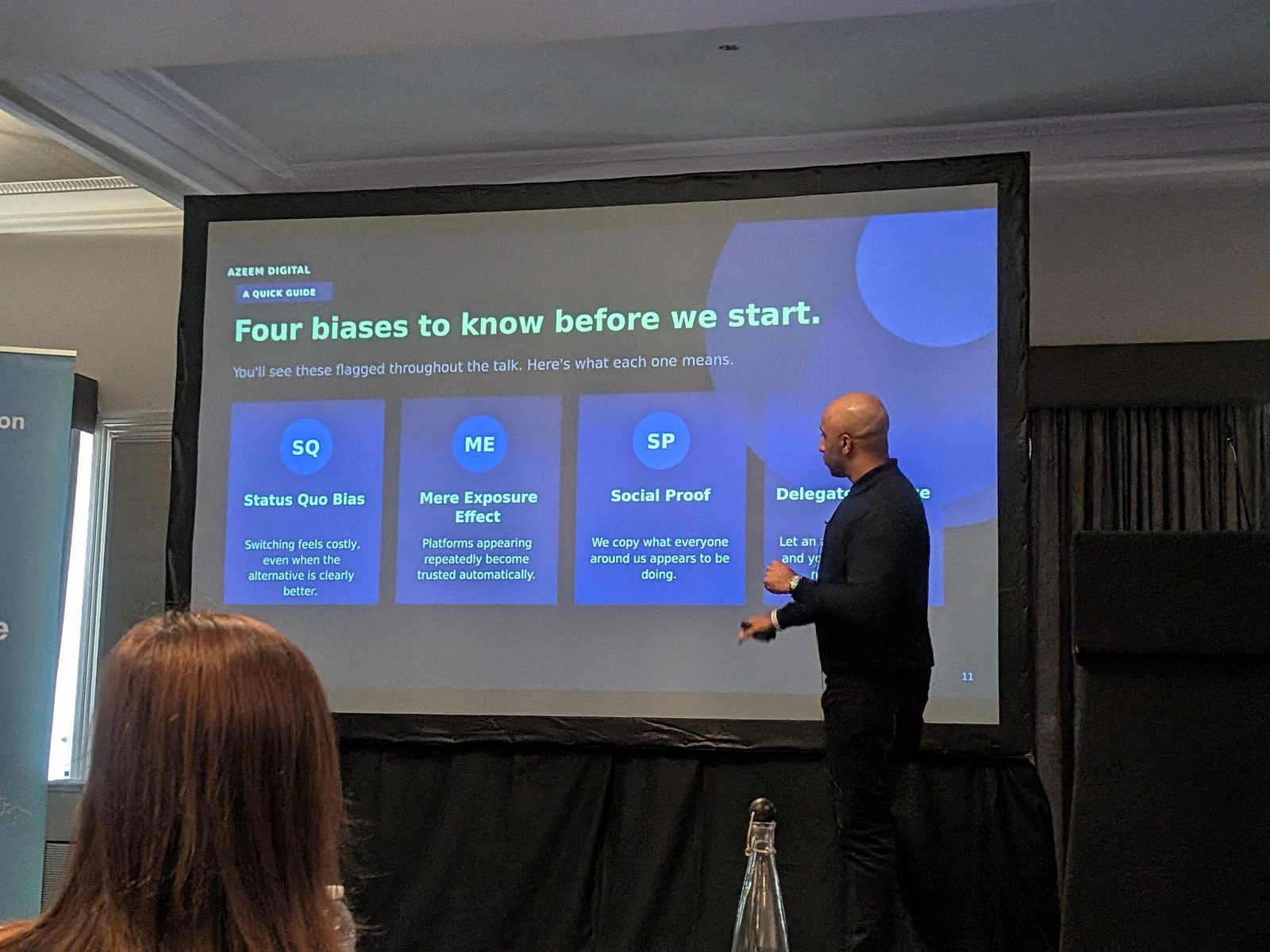 Slide "Four biases to know before we start": Status Quo Bias, Mere Exposure Effect, Social Proof, Delegated Choice