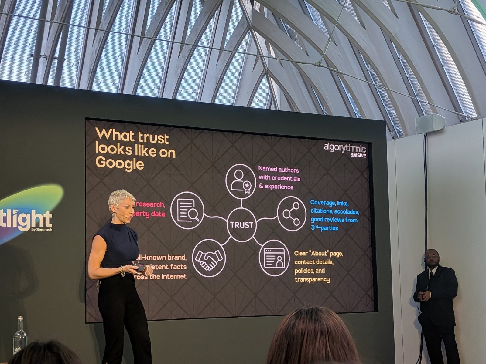 Slide: What trust looks like on Google, named authors, third-party coverage and reviews, a clear About page, a well-known brand and first-party research
